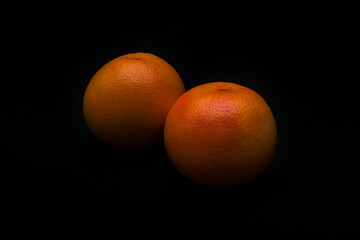 Grapefruit on dark background