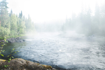 morning mist over the river Pistojoki North Karelia, landscape stones August 2014