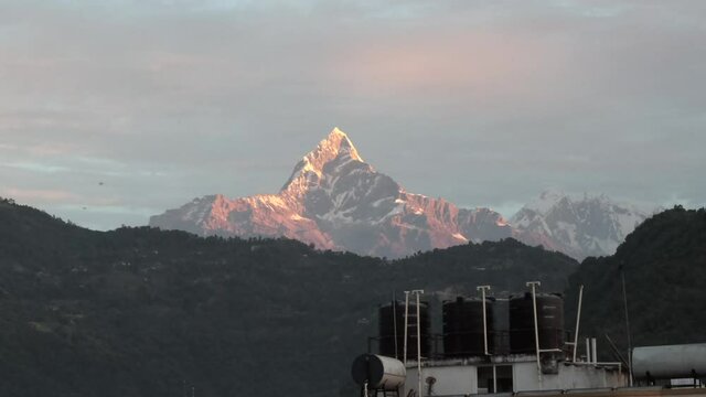 Snow Peak of Machapuchare Mountain at Sunrise in the Himalayas in Nepal