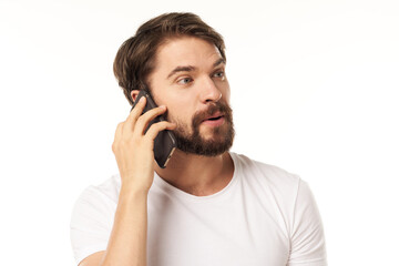 Man talking on the phone white t-shirt technology cropped 