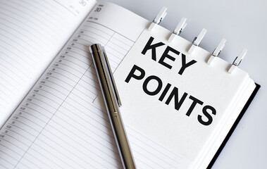 text KEY POINTS on the short note texture background with pen
