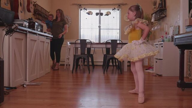 Little Girl Doing Ballet On Zoom During Pandemic