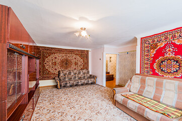 Russia, Moscow- April 17, 2020: interior room apartment shabby old sloppy not modern furnishings....