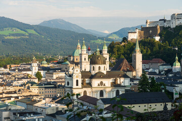 Fototapeta na wymiar Salzburg Cathedral near Festung Hohensalzburg fortress in afternoon light. Austria