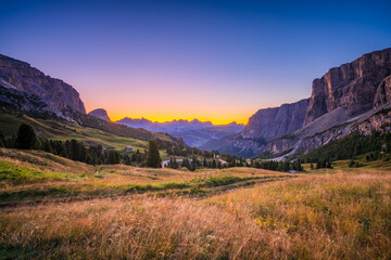 Passo di val Gardena valley at sunrise. Dolomites Alps. Italy