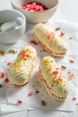 Sweet and homemade eclairs made of white chocolate