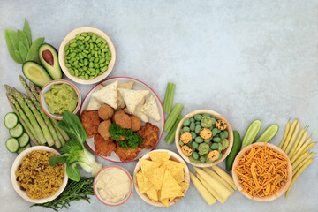 Plant based vegan food for ethical eating with tofu meat substitute foods, vegetables, snacks, grains and dips. High in protein, antioxidants, vitamins, minerals and fibre. Healthy planet concept.
