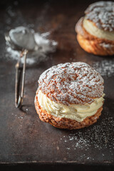 Yummy and sweet cream puffs made of sugar and cream