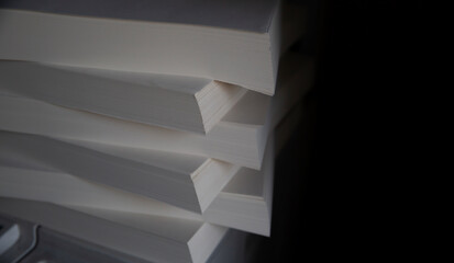 close up of stacked book pages