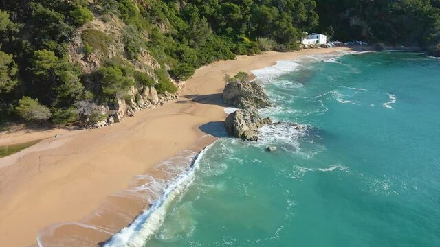 mediterranean beach paradisiaca turquoise blue waters no people aerial view drone spain catalunya costa brava blanes lloret de mar mallorca balearic islands