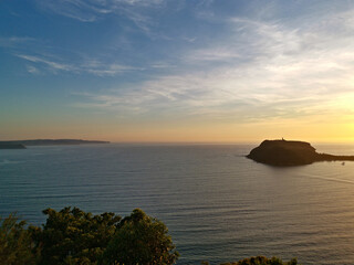 Beautiful view of sunrise above the sea, West Head Lookout towards Barrenjoey Head, Palm beach, Sydney, New South Wales, Australia
