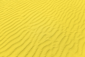 closeup of sand pattern of a beach in the summer