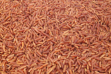 Red rice background or texture