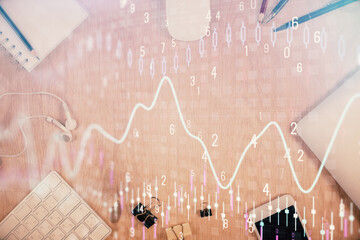 Multi exposure of forex graph hologram over desktop with phone. Top view. Mobile trade platform...