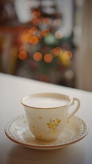A cup of hot milk with bokeh background