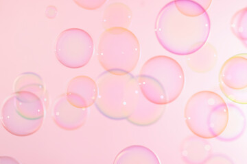 Beautiful colorful pink circles soap bubbles texture background. happy fun summer holiday pink background