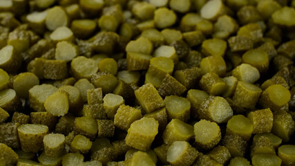 chopped Pickled gherkins cucumbers top view rotate
