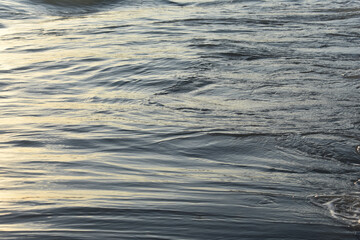 waves foam on the sea