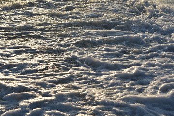 waves foam on the sea