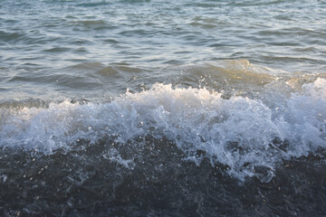 waves foam on the sea