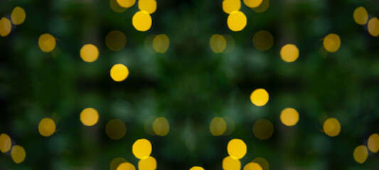 Green bokeh from christmas tree with golden lights