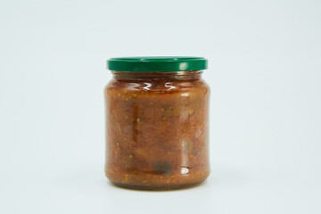 Canned eggplant appetizer in a glass jar. Home canning.