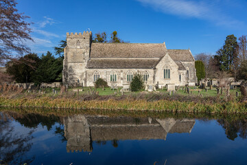 Fototapeta na wymiar Church of St. Cyr, Stonehouse and the Stroudwater Canal. Near Stroud Gloucestershire, UK