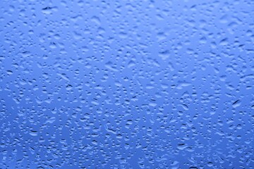 Frozen drops close-up. Natural background.