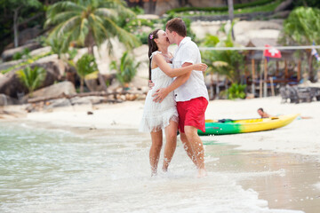 Fototapeta premium loving couple on beach