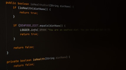 Programming code screen. Dark theme of IDE, dark mode of code editor. Writing programming code on...