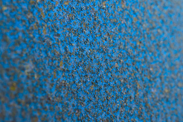 Unusual industrial background or wallpaper in blue and black colors. Rough textured matte surface....