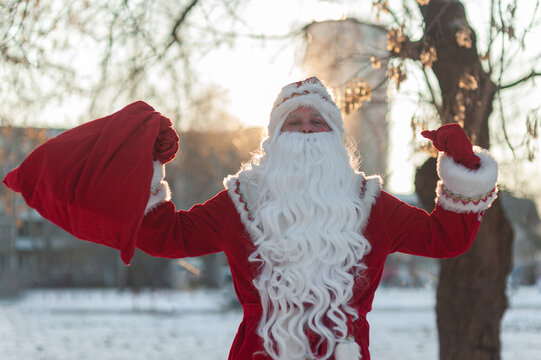 santa claus outdoors in winter on a sunny day