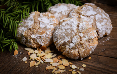Sweet almond cookies on wooden table