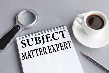 subject matter expert, text on white paper on gray background