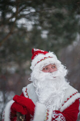 santa claus outdoors in winter on a sunny day