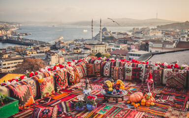Great panoramic view of Istanbul from high terrace decorated traditional colorful ornamental pillows