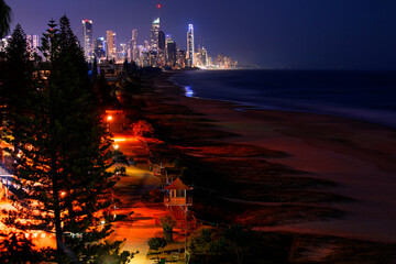 Surfers Paradise cityscape and beach pathways at night. View from Miami Hill