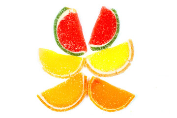 Fototapeta na wymiar Fruit multicolored marmalade on a white background