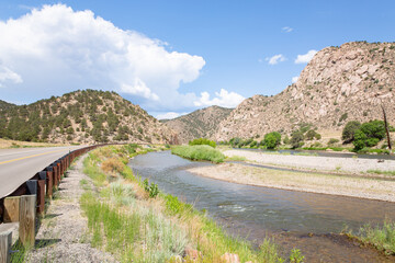 Rural road along the Arkansas River in Bighorn Sheep Canyon, Colorado, USA