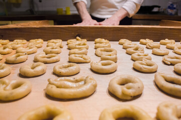 Taralli, typical salty biscuits handmade in southern Italy