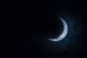 Half Moon in space in night sky. (Elements of this image furnished by NASA.)