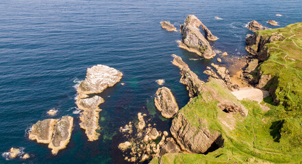 Amazing rugged coastline at Portnockie near Bow Fiddle on Moray Firth Coast