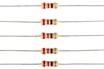 Close up shot of several electronic resistors isolated on white background. Carbon film resistors on white background. Macro shot various electronic components