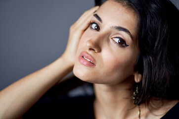 portrait of sexy woman in evening dress earrings model cropped view