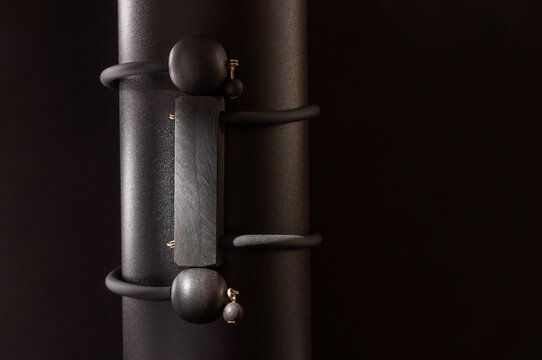 jet bracelet on black background. Low-key lighting