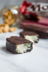Coconut and peanut coated chocolate