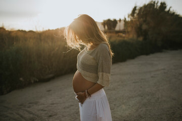pregnant sunset - mom expecting her baby
