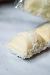 Coconut covered and filled chocolate bar