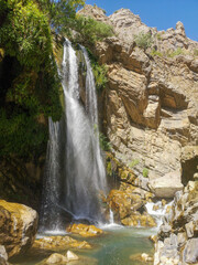 waterfall flowing in nature, cascade, cascade between rocks. Hakkari in Turkey
