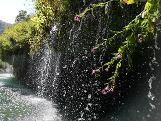 waterfall flowing in nature, cascade, cascade between rocks. Hakkari in Turkey
